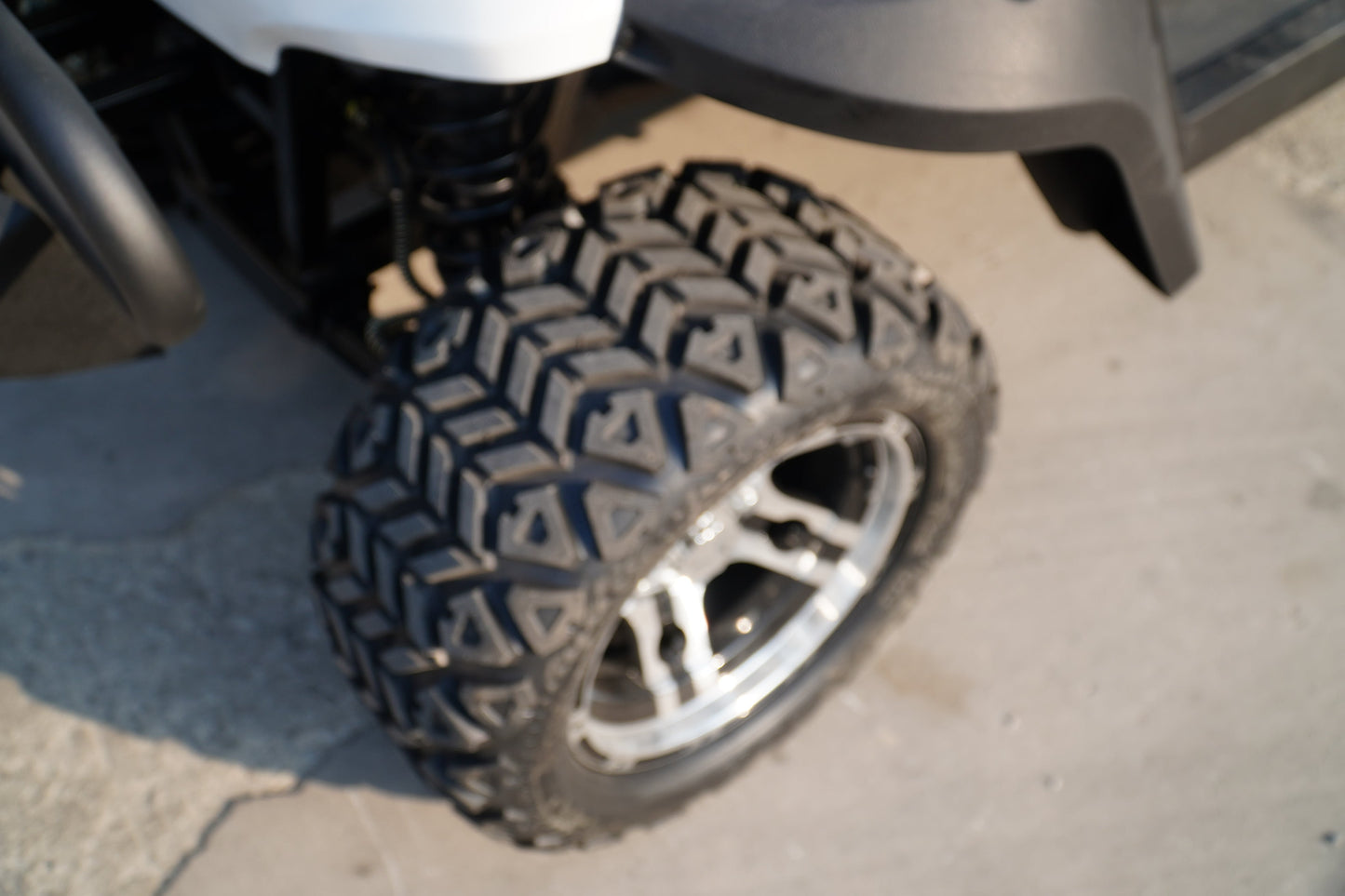 Close-up of a rugged tire on a Labadi Engineering Golf Cart designed for durability and traction