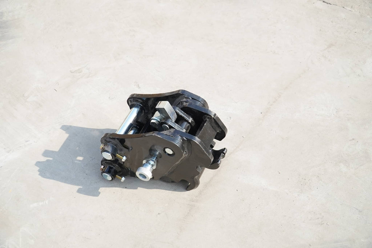 Rippa Australia black mechanical quick change excavator attachment on concrete surface