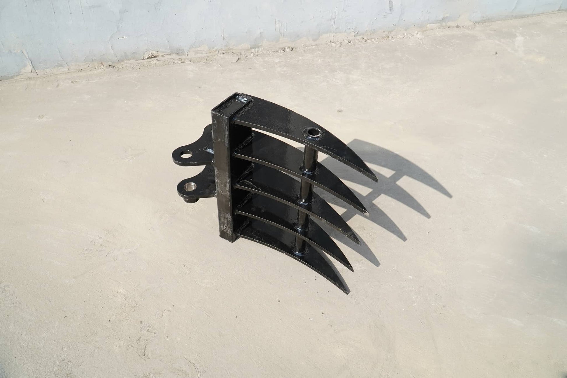 Rippa Australia mini excavator grapple attachment with four sharp claws for handling materials