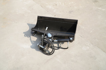Rippa Australia Excavator Tilt Bucket attachment in black with hydraulic hoses on concrete floor