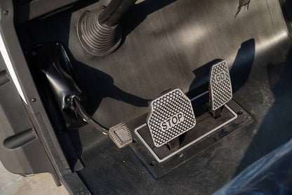 Golf Cart foot control area showing GO and STOP pedals for easy maneuvering