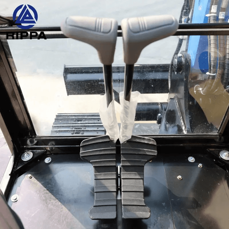Control pedals inside a Labadi Engineering Mini Excavator cabin for precise operation and maneuverability