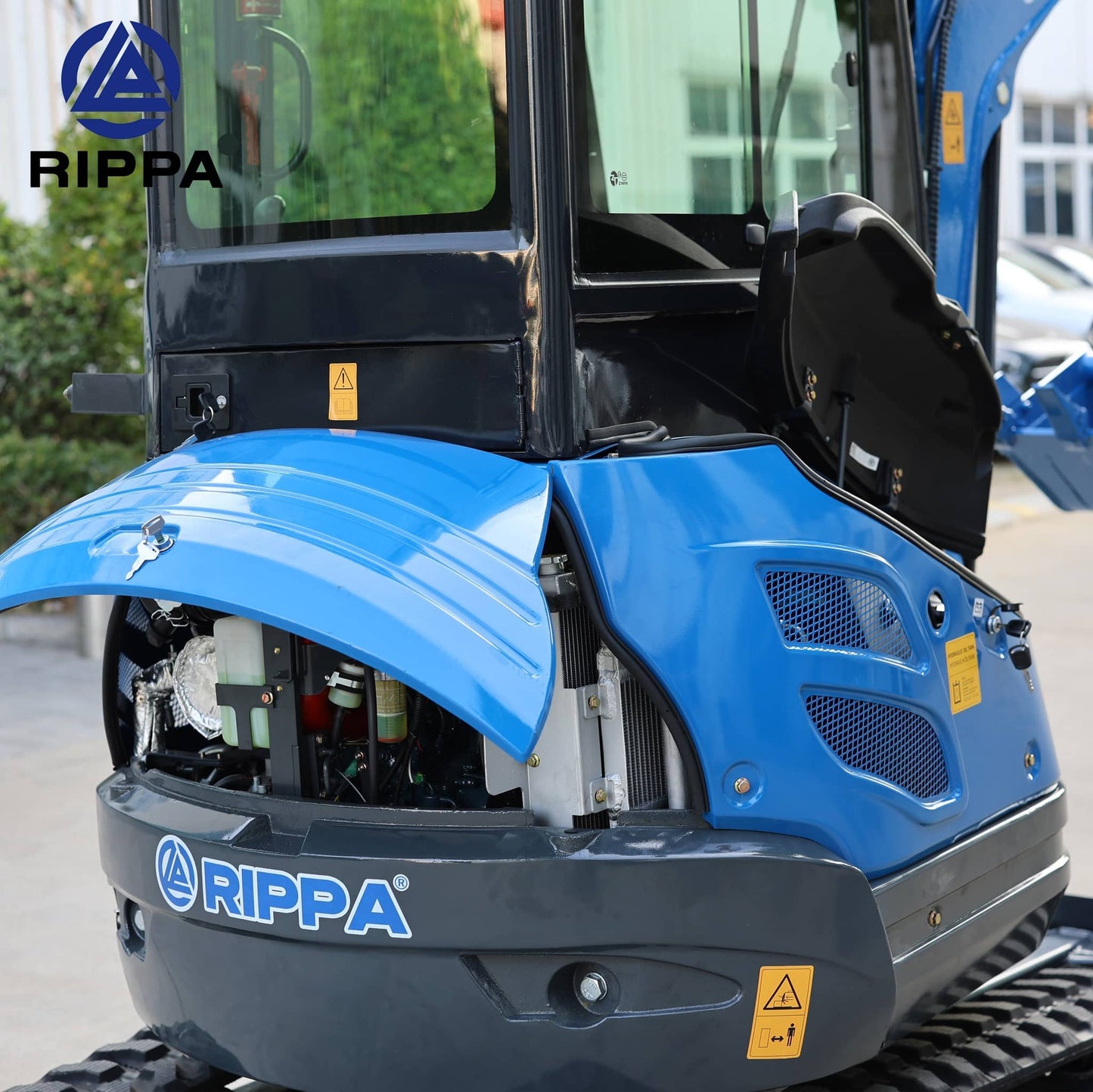 Labadi Engineering Mini Excavator side view showcasing the engine compartment and blue exterior design