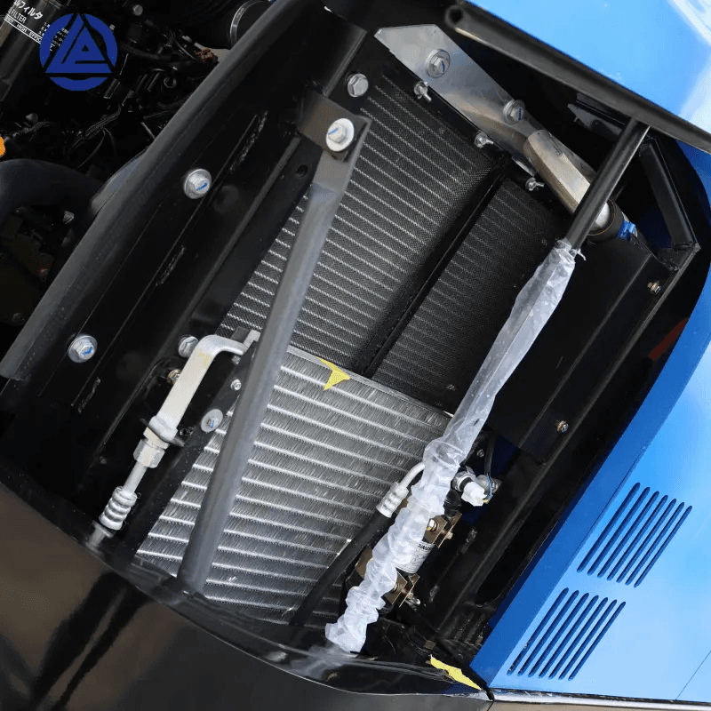 Detailed engine compartment of a Labadi Engineering Mini Excavator showing cooling system components