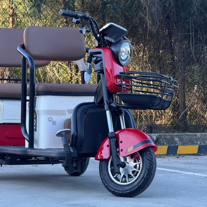 Labadi Engineering Wheel Trike in red and black with front basket and brown passenger seats